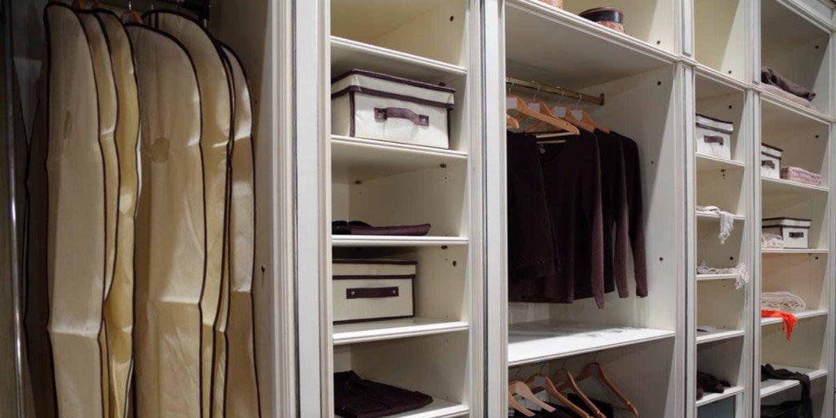 Organized master bedroom closet.